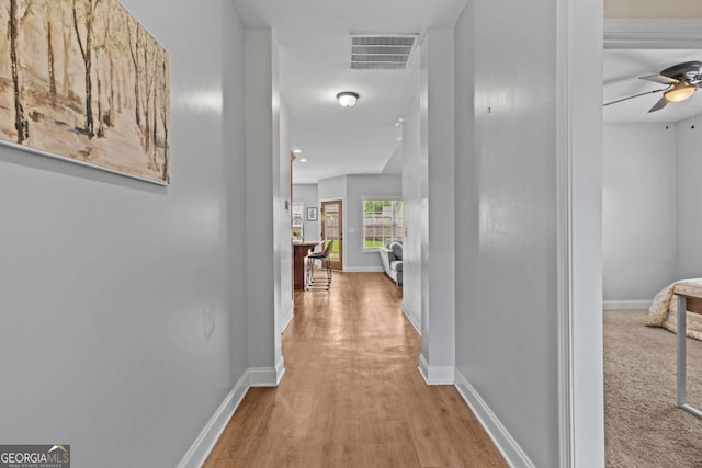 419 Highland Pointe Dr, Alto, GA 30510 - hallway with baseboards and wood finished floors