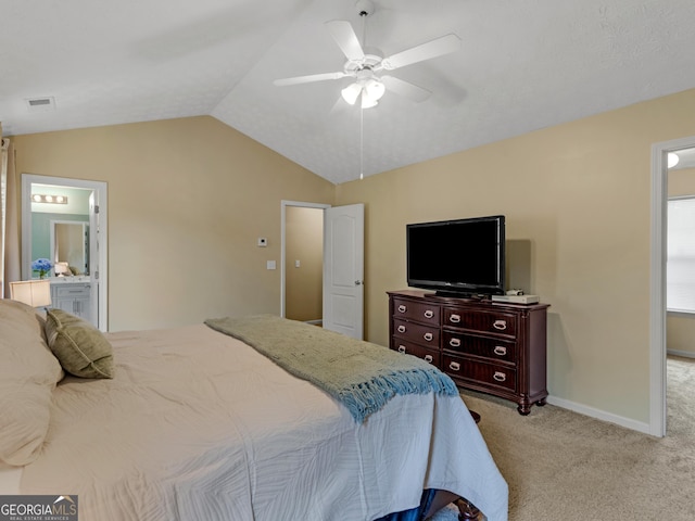 300 Furrow Creek Ct, Jackson, GA 30233 - bedroom with light colored carpet, vaulted ceiling, ensuite bathroom, a ceiling fan, and baseboards