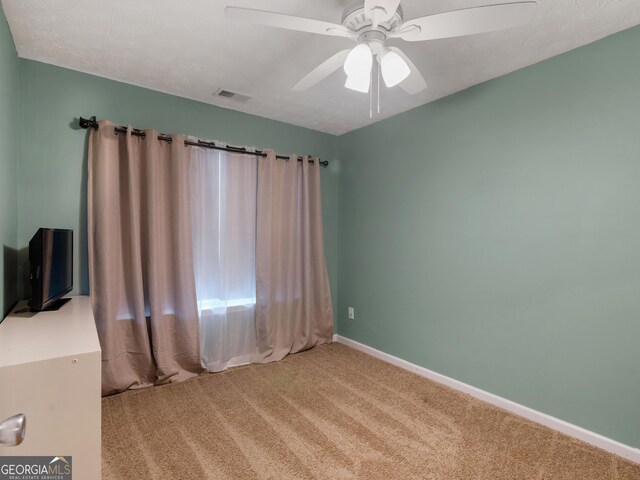 300 Furrow Creek Ct, Jackson, GA 30233 - empty room featuring carpet, ceiling fan, and baseboards
