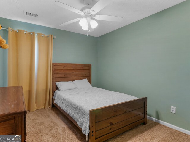 300 Furrow Creek Ct, Jackson, GA 30233 - carpeted bedroom with baseboards and ceiling fan