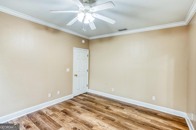 103 Mossy Creek Way, Ochlocknee, GA 31773 - empty room featuring crown molding, light wood-style floors, a ceiling fan, and baseboards