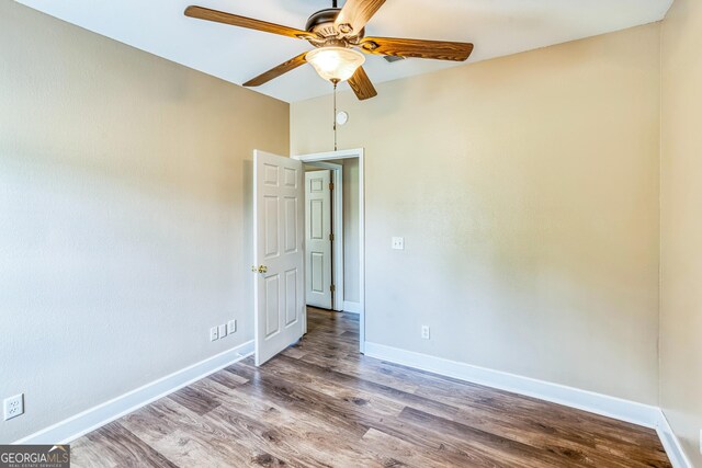 103 Mossy Creek Way, Ochlocknee, GA 31773 - spare room featuring a ceiling fan, wood finished floors, and baseboards