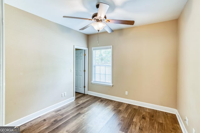 103 Mossy Creek Way, Ochlocknee, GA 31773 - empty room with wood finished floors, baseboards, and ceiling fan