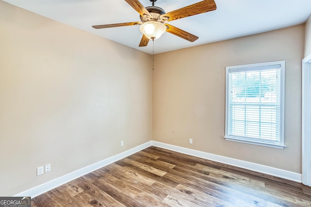 103 Mossy Creek Way, Ochlocknee, GA 31773 - unfurnished room with baseboards, wood finished floors, and ceiling fan