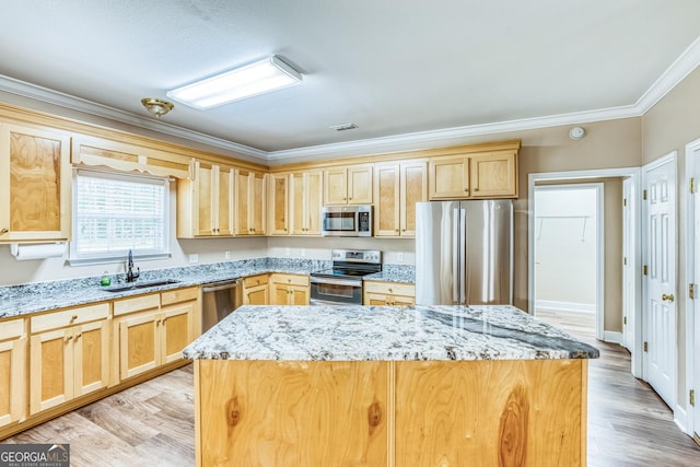 103 Mossy Creek Way, Ochlocknee, GA 31773 - kitchen featuring stainless steel appliances, crown molding, a sink, and light brown cabinetry