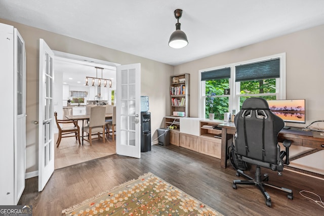 1005 Wellers Ct, Roswell, GA 30076 - office area with french doors, wood finished floors, a chandelier, and baseboards