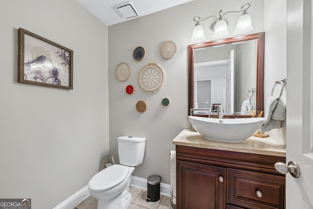 1005 Wellers Ct, Roswell, GA 30076 - half bathroom featuring vanity, baseboards, and toilet