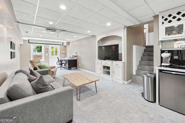 1005 Wellers Ct, Roswell, GA 30076 - living area featuring light carpet, recessed lighting, stairs, a drop ceiling, and baseboards