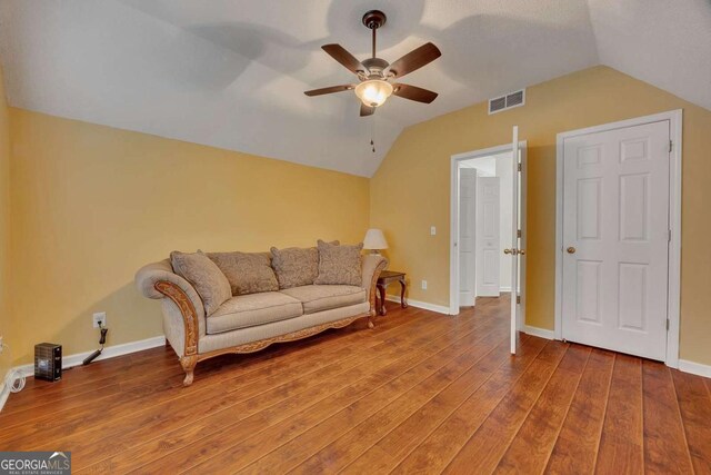 2018 Township Dr, Woodstock, GA 30189 - sitting room featuring vaulted ceiling, a ceiling fan, and hardwood / wood-style floors