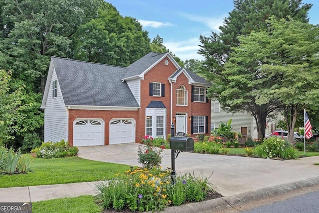 2018 Township Dr, Woodstock, GA 30189 - view of front of house with brick siding, an attached garage, a shingled roof, driveway, and a front yard