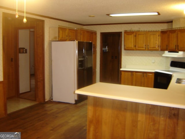 6177 County Road 266, Five Points, AL 36855 - kitchen with white refrigerator with ice dispenser, range with electric cooktop, range hood, brown cabinetry, and crown molding