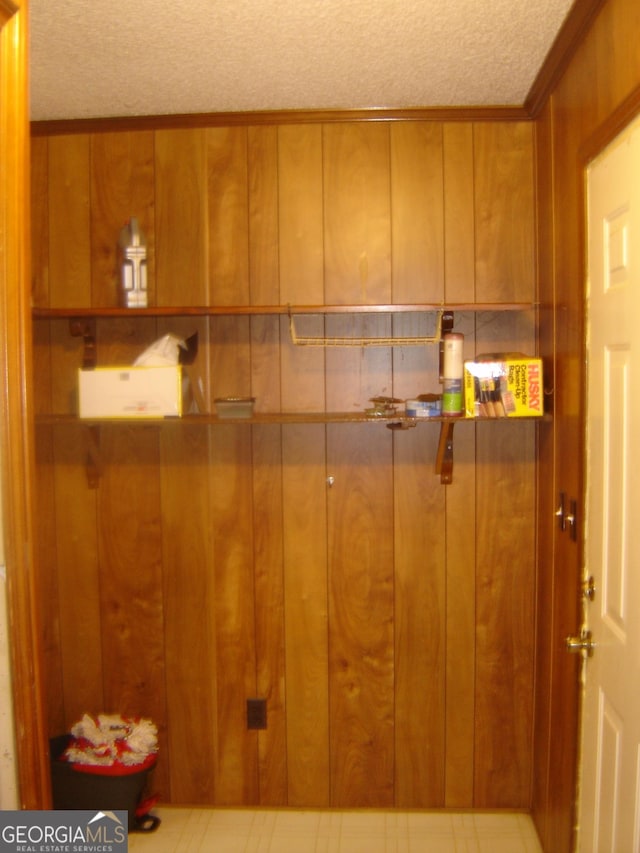 6177 County Road 266, Five Points, AL 36855 - interior space with a textured ceiling and wood walls