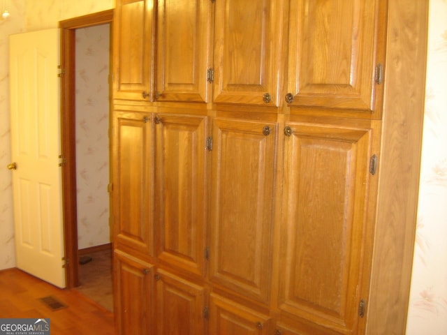 6177 County Road 266, Five Points, AL 36855 - detailed view of wood finished floors and wallpapered walls