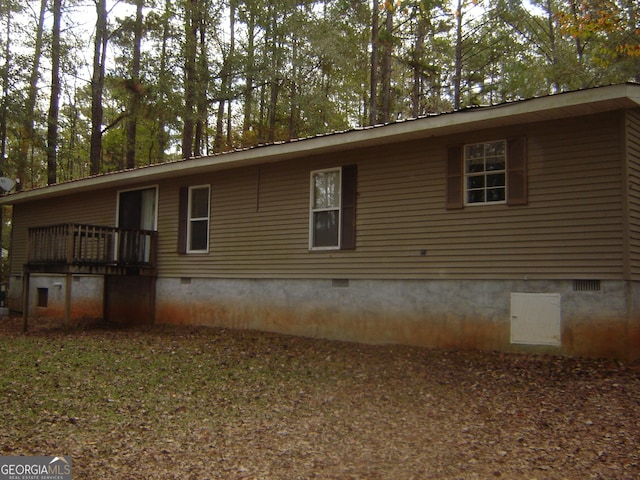 6177 County Road 266, Five Points, AL 36855 - view of property exterior with crawl space and a wooden deck