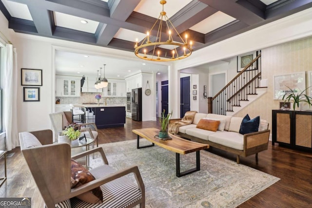 4085 Hillcrest View Ct, Suwanee, GA 30024 - living area with a chandelier, stairs, dark wood-type flooring, beam ceiling, and coffered ceiling
