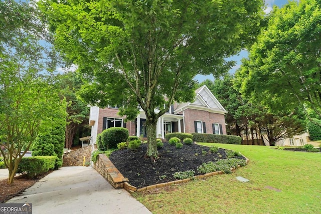 4085 Hillcrest View Ct, Suwanee, GA 30024 - obstructed view of property with brick siding and a front lawn
