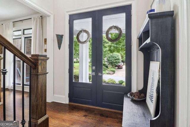 4085 Hillcrest View Ct, Suwanee, GA 30024 - entrance foyer featuring french doors, dark wood-type flooring, baseboards, and stairs
