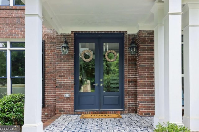 4085 Hillcrest View Ct, Suwanee, GA 30024 - doorway to property with french doors and brick siding