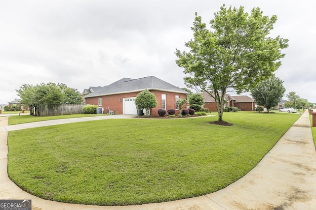 201 Loudon Hill Dr, Warner Robins, GA 31088 - view of front facade with driveway, an attached garage, brick siding, and roof with shingles