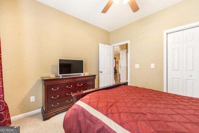 201 Loudon Hill Dr, Warner Robins, GA 31088 - bedroom with light colored carpet, a closet, ceiling fan, and baseboards