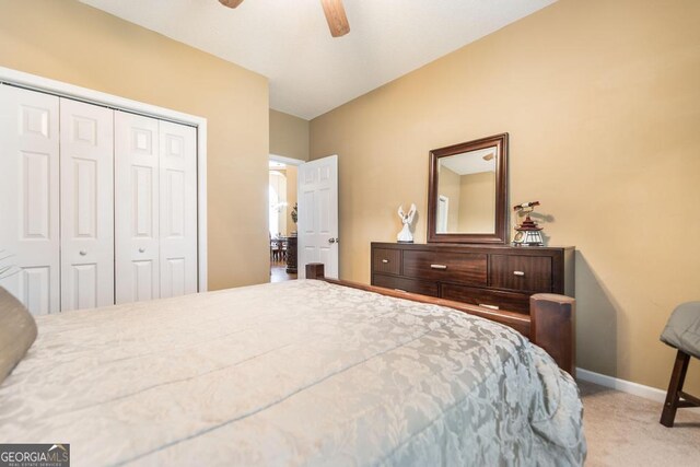 201 Loudon Hill Dr, Warner Robins, GA 31088 - bedroom with carpet floors, a closet, baseboards, and a ceiling fan