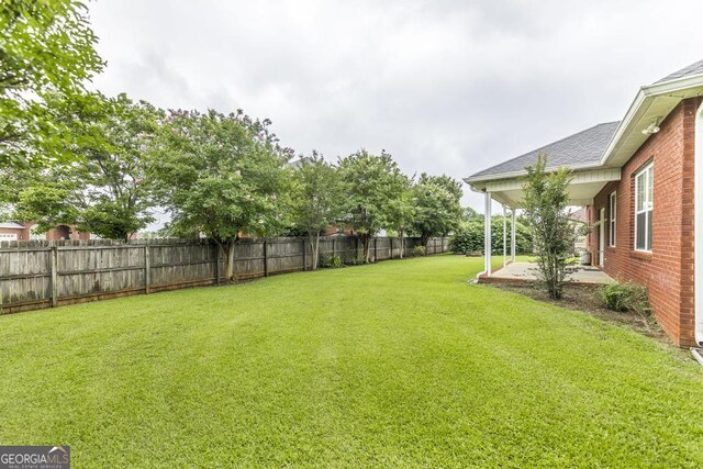 201 Loudon Hill Dr, Warner Robins, GA 31088 - view of yard with a patio