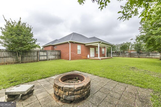 201 Loudon Hill Dr, Warner Robins, GA 31088 - view of patio with a fire pit