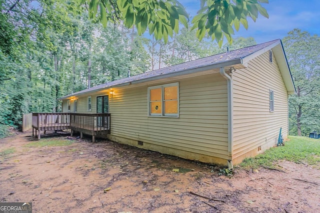 220 Harwell Rd NW, Atlanta, GA 30331 - view of side of home featuring crawl space and a wooden deck