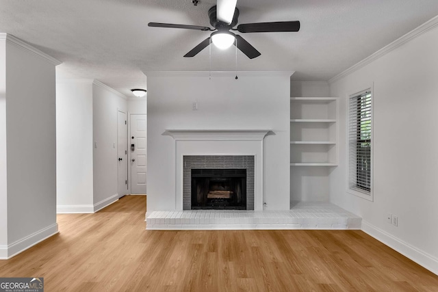 1603 Cumberland Ct, Smyrna, GA 30080 - unfurnished living room featuring wood finished floors, a ceiling fan, baseboards, built in shelves, and crown molding