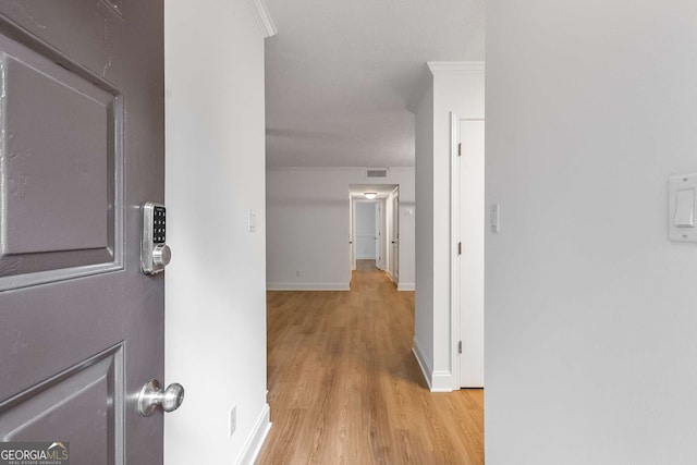 1603 Cumberland Ct, Smyrna, GA 30080 - hall with light wood-type flooring, ornamental molding, and baseboards