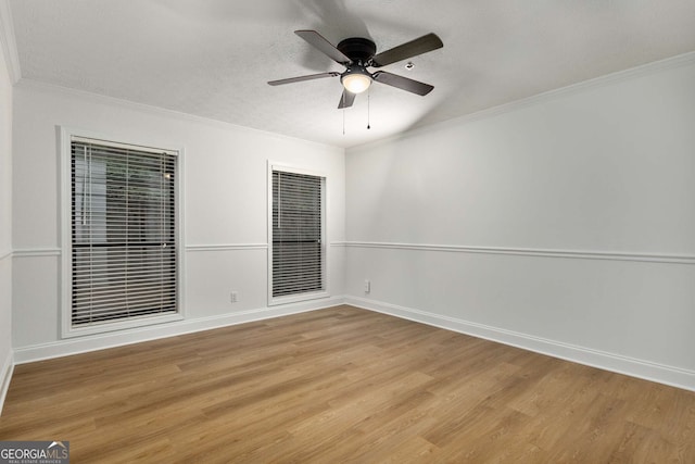 1603 Cumberland Ct, Smyrna, GA 30080 - unfurnished room with light wood finished floors, a ceiling fan, crown molding, baseboards, and a textured ceiling