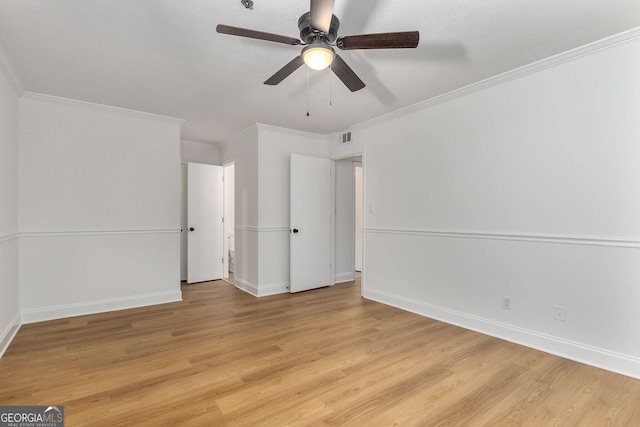 1603 Cumberland Ct, Smyrna, GA 30080 - spare room with light wood-style flooring, ceiling fan, baseboards, and crown molding