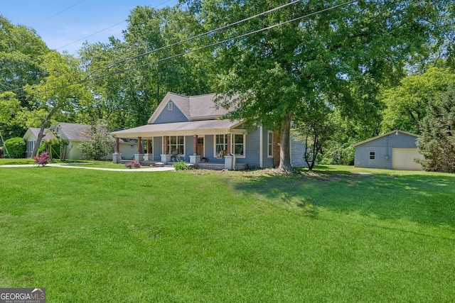 1382 6th Ave, Auburn, GA 30011 - farmhouse inspired home featuring a porch, a detached garage, a front yard, and an outdoor structure