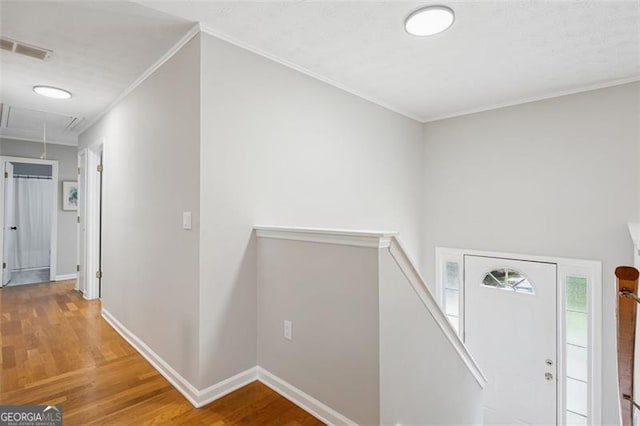 835 Navajo, Covington, GA 30016 - entryway featuring wood finished floors and crown molding