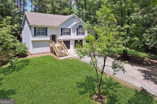 835 Navajo, Covington, GA 30016 - split foyer home with a front yard and driveway