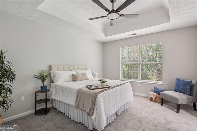 835 Navajo, Covington, GA 30016 - bedroom featuring a raised ceiling, carpet flooring, and a ceiling fan