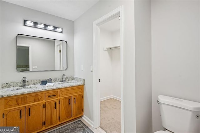 835 Navajo, Covington, GA 30016 - bathroom with double vanity and toilet