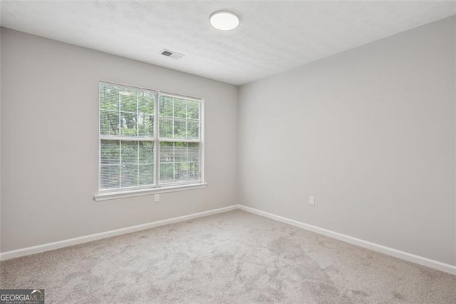 835 Navajo, Covington, GA 30016 - carpeted spare room featuring baseboards