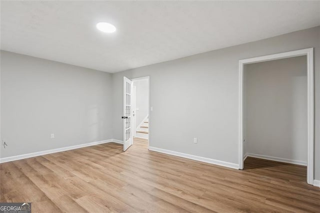 835 Navajo, Covington, GA 30016 - unfurnished room featuring light wood-style floors