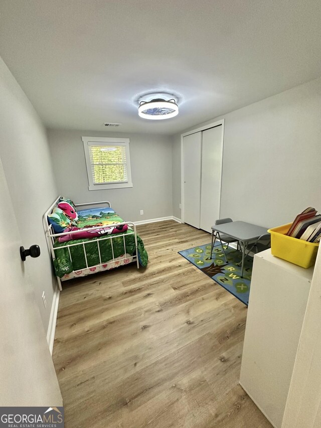 2165 S River Rd, Franklin, GA 30217 - bedroom featuring wood finished floors and baseboards