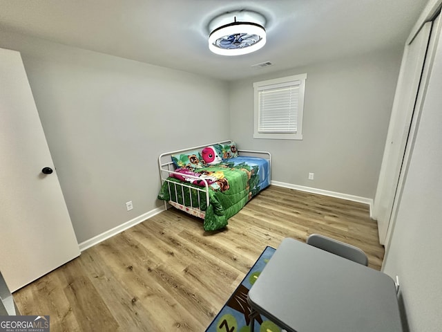 2165 S River Rd, Franklin, GA 30217 - bedroom with wood finished floors and baseboards