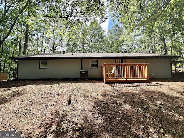 2165 S River Rd, Franklin, GA 30217 - back of property with central air condition unit and a deck