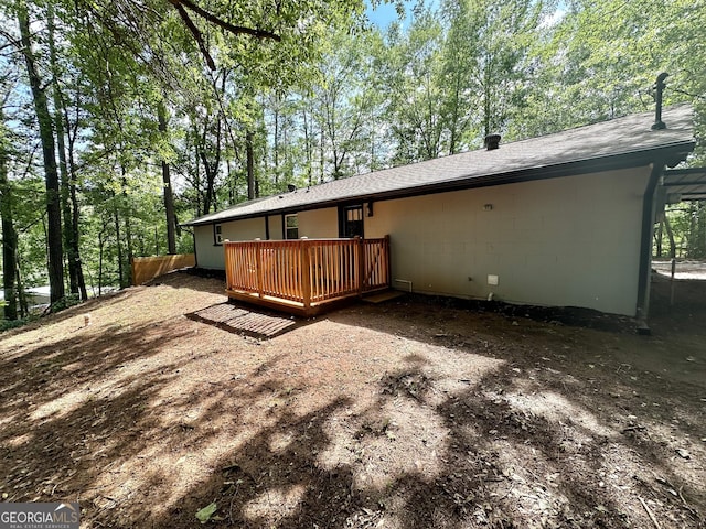 2165 S River Rd, Franklin, GA 30217 - back of property with a deck, roof with shingles, and concrete block siding