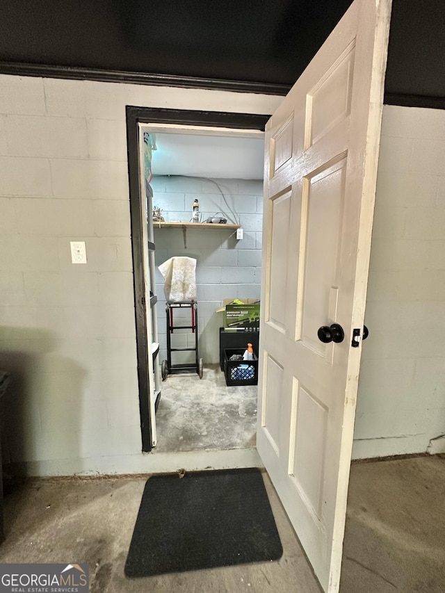 2165 S River Rd, Franklin, GA 30217 - corridor with unfinished concrete floors and concrete block wall