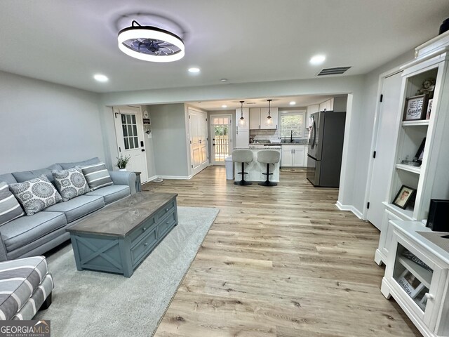 2165 S River Rd, Franklin, GA 30217 - living area featuring recessed lighting, baseboards, and light wood-type flooring