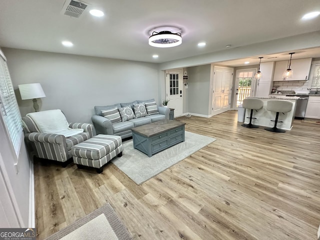 2165 S River Rd, Franklin, GA 30217 - living room with light wood finished floors, recessed lighting, and baseboards
