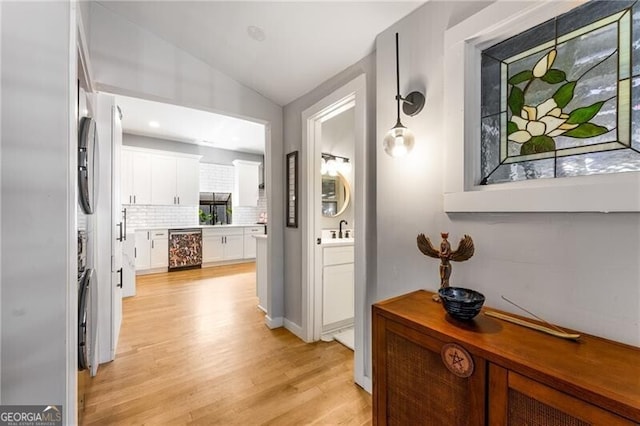 611 Pickett St SE, Atlanta, GA 30316 - hall with vaulted ceiling, light wood-type flooring, and wine cooler