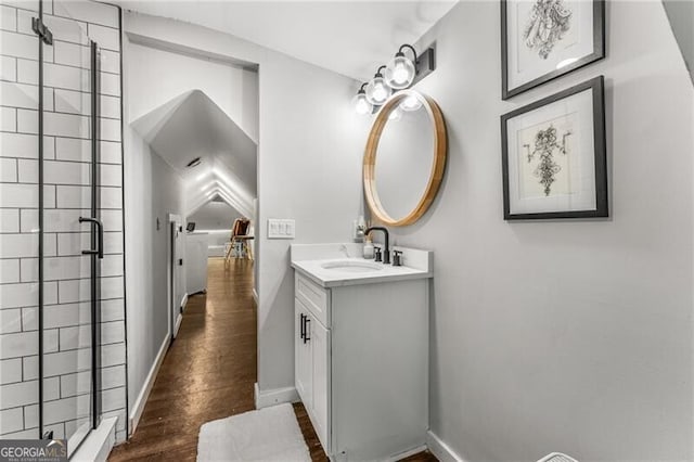 611 Pickett St SE, Atlanta, GA 30316 - full bath with vanity, a shower stall, and wood finished floors