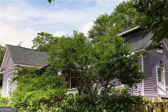 611 Pickett St SE, Atlanta, GA 30316 - view of side of property with a shingled roof