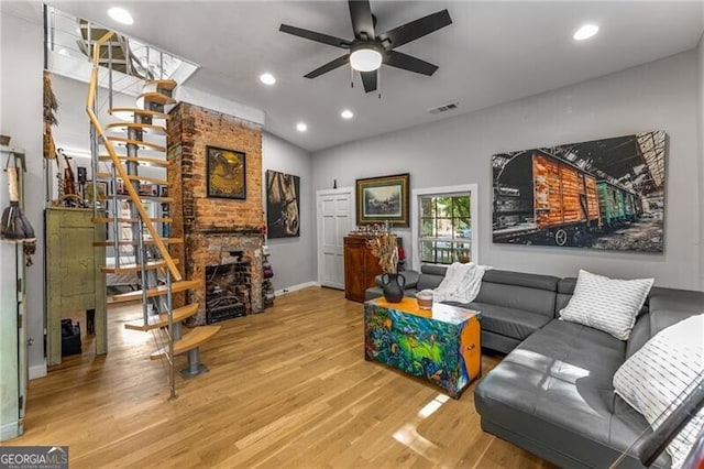 611 Pickett St SE, Atlanta, GA 30316 - living room with a ceiling fan, stairway, wood finished floors, recessed lighting, and a fireplace